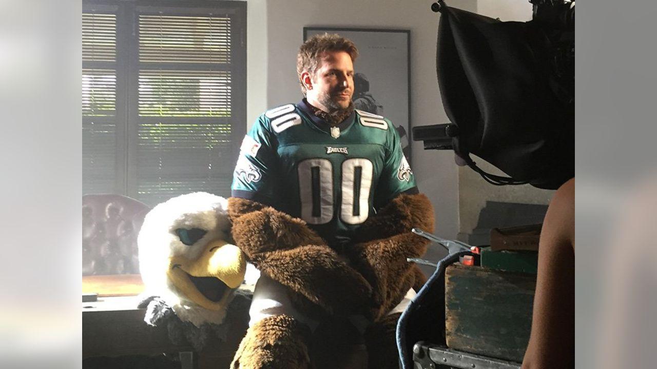 In the promo, Cooper, a Jenkintown, Pennsylvania native, brought the SWOOP costume to a party and forgot that the Eagles didn't play until Monday night